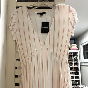 Forever 21 maxi dress with salmon colored vertical stripes. Size small. NWT
